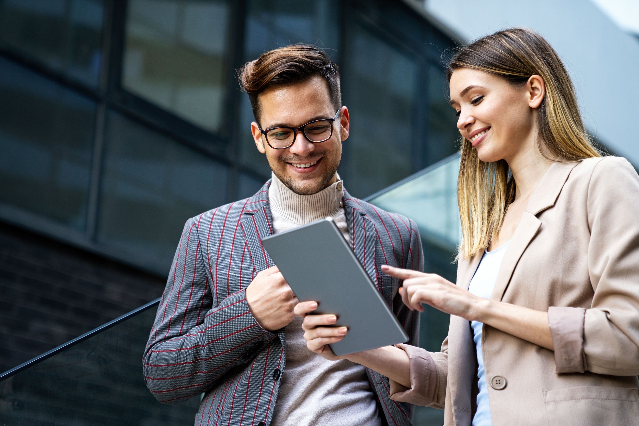 Man is showing something on the tablet