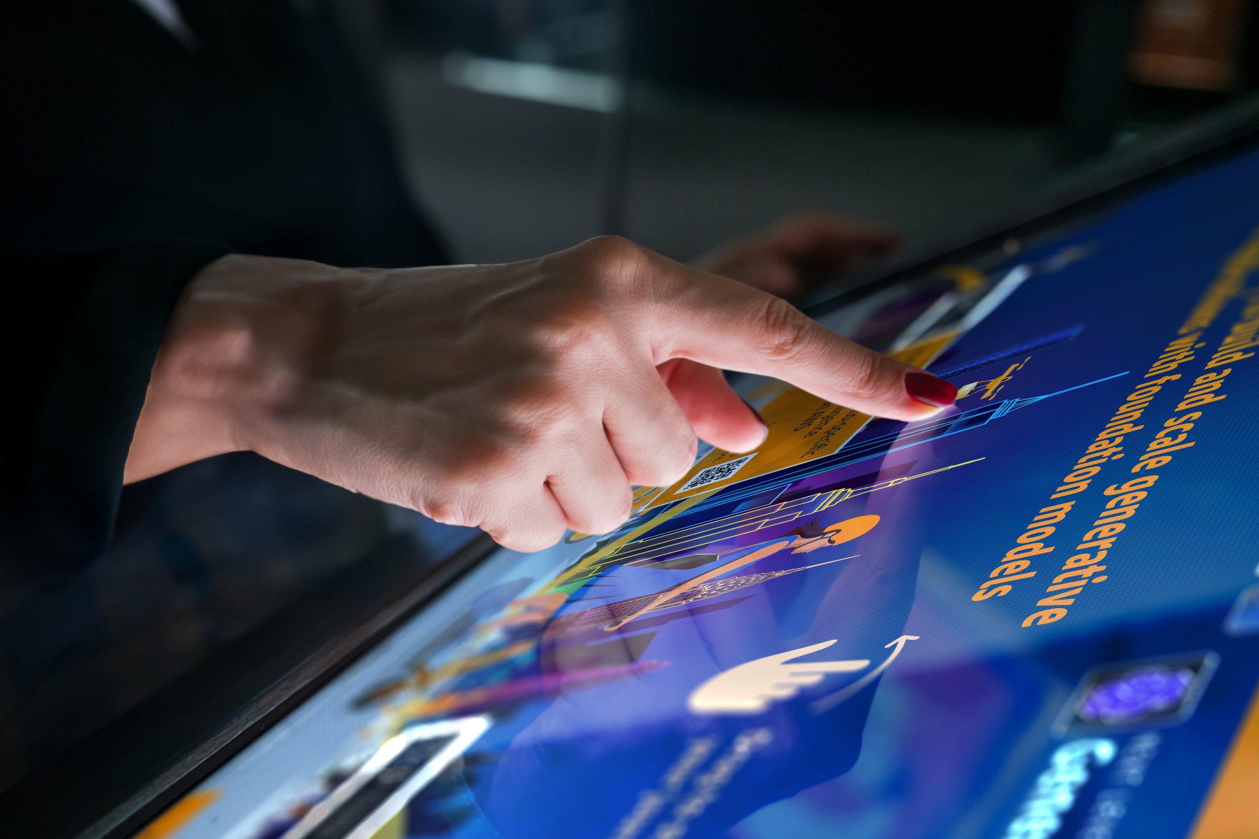 Woman using interactive touchscreen 